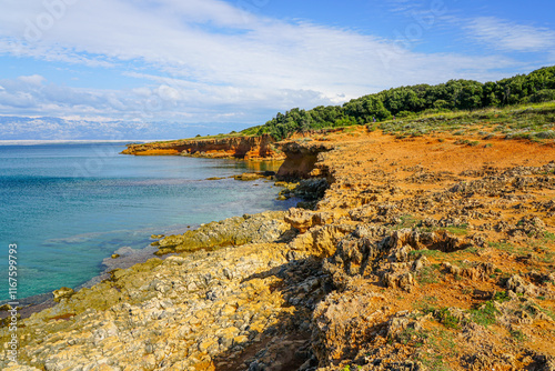 Fototapeta Naklejka Na Ścianę i Meble -  Crvenka beach, Vir, Croatia, the sand of the beach is painted with the intense red color
