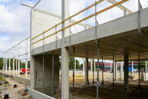Unfinished new modern reinforced concrete and metal structure building frame