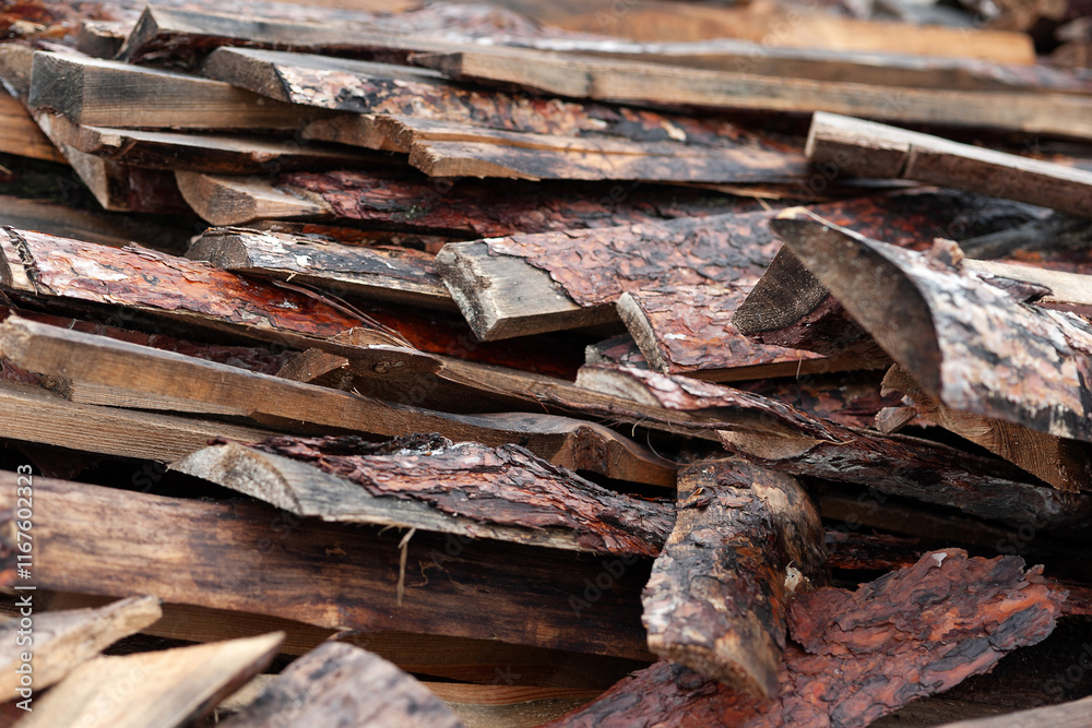 Broken boards. A pile of broken boards at a sawmill. Selective focus Broken boards. A pile of broken boards at a sawmill. Selective focus