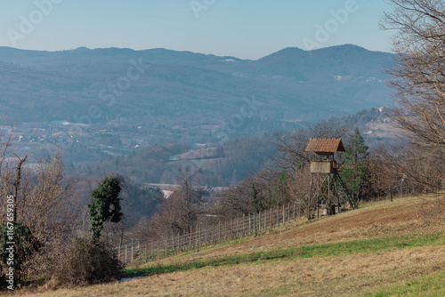 Obraz na płótnie Epic early winter view of hunters lookout from away, visible lookout and great panorama of the dolenjska region valley in slovenia.. w salonie