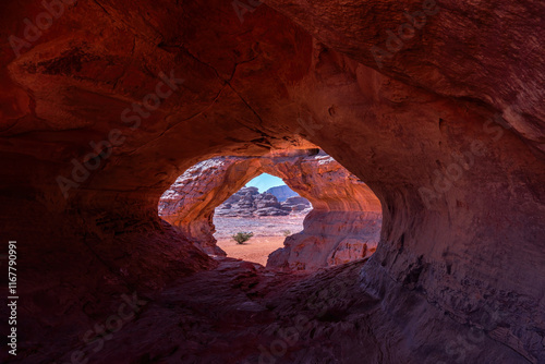 Tadrart Rouge, meaning Red Mountain, a mountain range in southeastern Algeria, part of the Algerian Desert providing massive dunes, rock formations and Martian landscapes photo