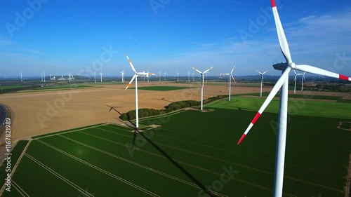 Wind turbines in the foreground and steam-emitting coal-fired power plants in the background, symbolizing the renewal of Germany's energy infrastructure.