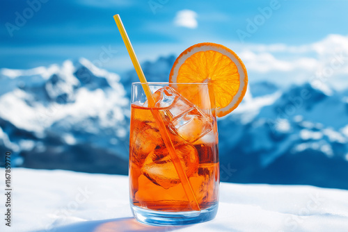 Aperol Spritz Cocktail in Winter Mountains, orange cocktail with ice cube, in winter, après-ski