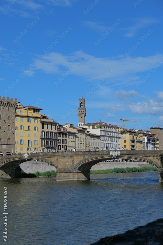 Fototapeta premium The Daily Life of the Arno River in Florence, Romantic Italy