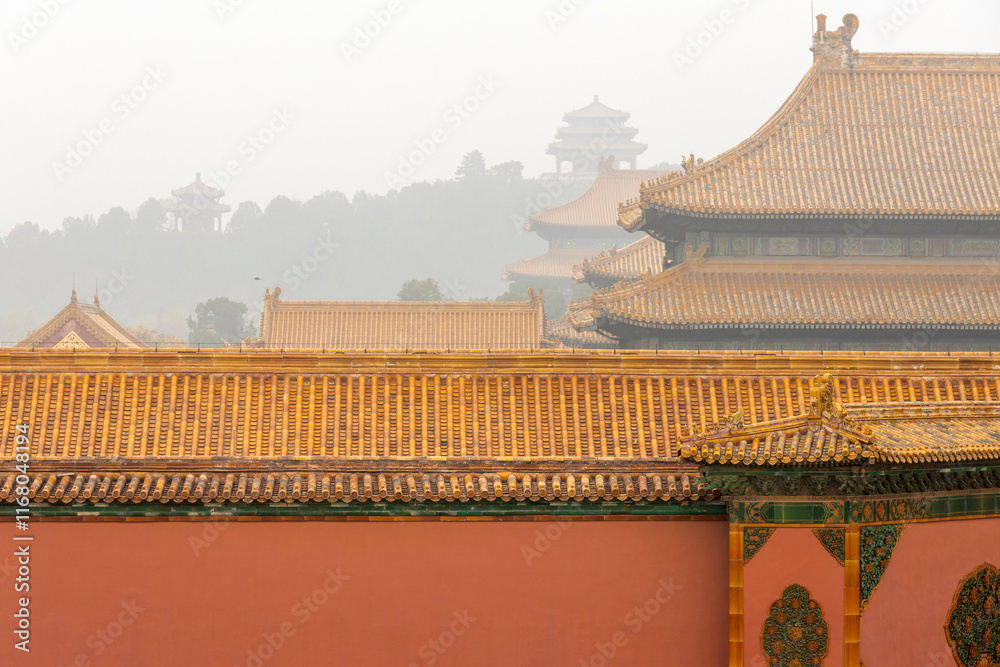 Roof of ancient building in Forbidden City with yellow tile and red wall. Roof of ancient building in Forbidden City with yellow tile and red wall.