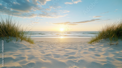 Fototapeta Naklejka Na Ścianę i Meble -  serene beach scene with gentle waves and golden sunset light