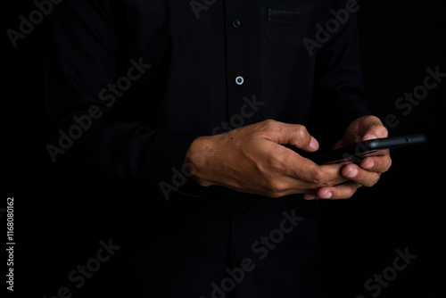 Asian business man pointing at smart phone, tablet display to monitor stock movements and inform about goals to the team. Isolated man holding display tablet by pointing at it.