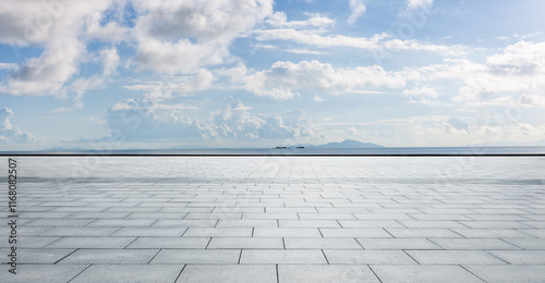 Empty square floor and coastline with sky clouds nature landscape in summer. Parking lot by the sea.