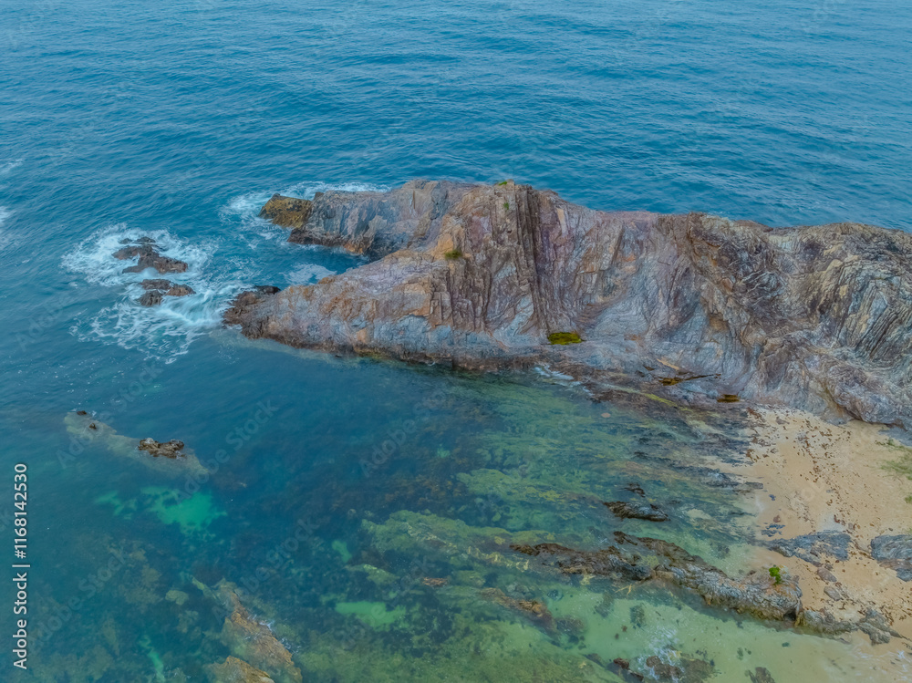 Obraz premium Top down sunrise over Guerilla Bay