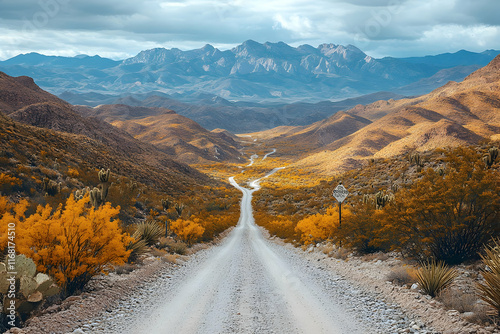 Scenic desert road winding through mountains.
