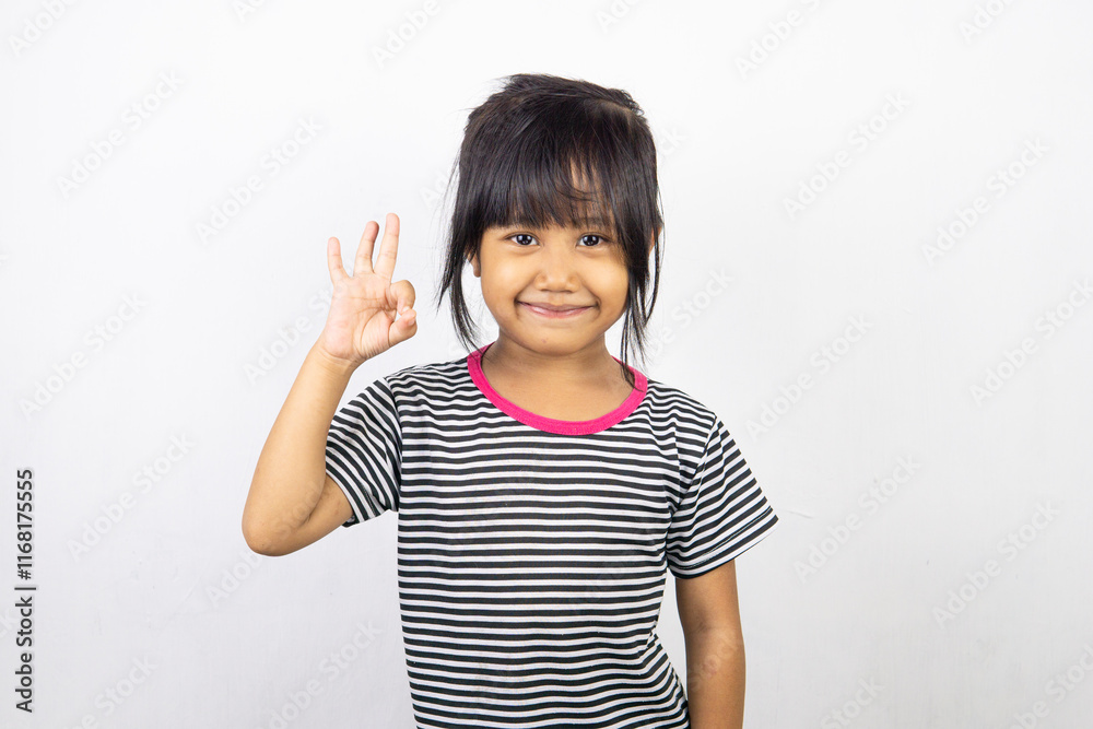 Portrait of little Asian girl posing on white background Portrait of little Asian girl posing on white background