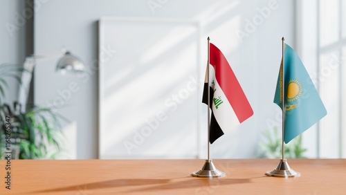 FLAGS OF IRAQ AND KAZAKHASTAN ON TABLE photo