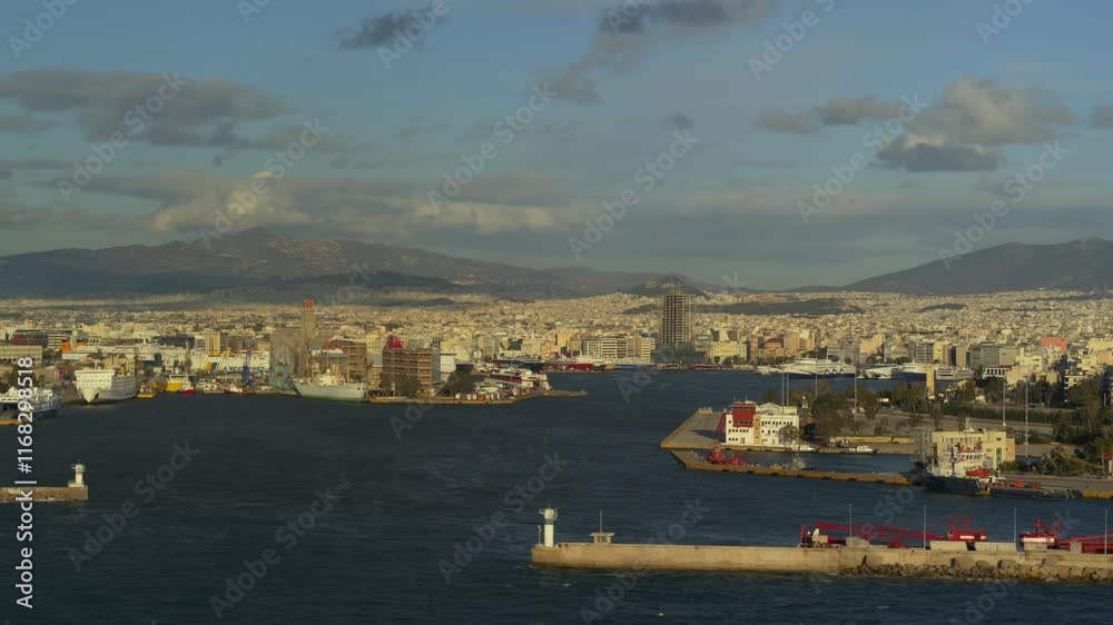 Drone shot of Piraeus seaport in Athens, Greece with clouds Drone shot of Piraeus seaport in Athens, Greece with clouds