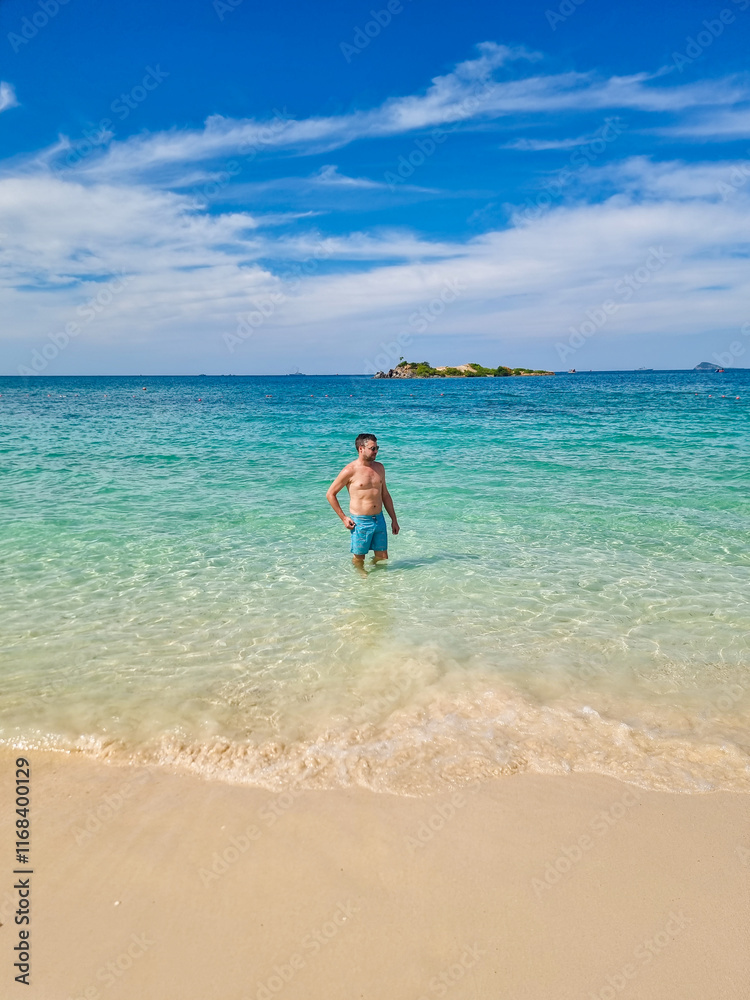Exploring the tranquil waters of Samae San Island in Thailand on a sunny day Exploring the tranquil waters of Samae San Island in Thailand on a sunny day
