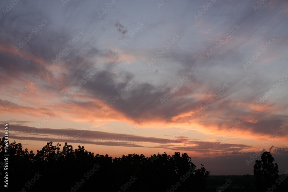 Obraz premium Rose sunset and colorful clouds