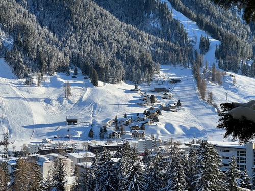 A fairytale winter atmosphere and a magnificent panorama on the mountine Swiss tourist resort of Davos - Canton of Grisons, Switzerland (Kanton Graubünden, Schweiz) photo