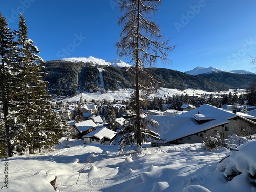 A fairytale winter atmosphere and a magnificent panorama on the mountine Swiss tourist resort of Davos - Canton of Grisons, Switzerland (Kanton Graubünden, Schweiz) photo