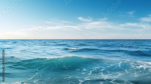 Ocean Waves Crashing Under a Blue Sky