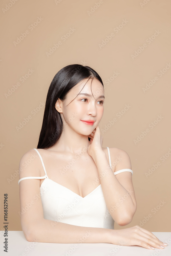 Young Asian beauty woman long hair with korean makeup style on face and perfect skin on isolated beige background. Facial treatment, Cosmetology, plastic surgery. Young Asian beauty woman long hair with korean makeup style on face and perfect skin on isolated beige background. Facial treatment, Cosmetology, plastic surgery.