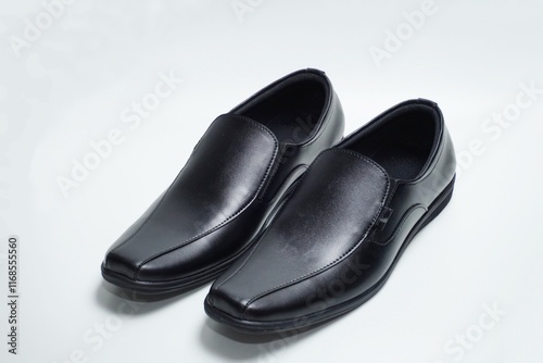 Black pantofel shoes isolated on white background