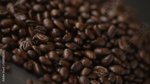 Coffee beans close up rotating with shallow depth of field