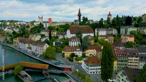 4K Drone Video of the Musegg Wall near the Reuss River in Lucerne, Switzerland photo