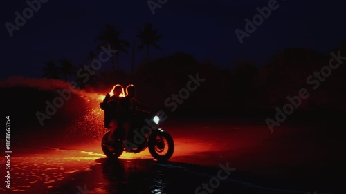 Man and woman ride motorcycle along the ocean in Bali with red signal fire or a rocket. Couple sitting or riding on a scooter on beach, sunset. Concept of friendship, love. Adventures on road trip