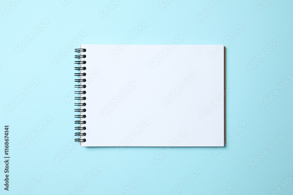 Flat lay with notebook on color background, top view Flat lay with notebook on color background, top view