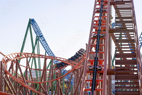 Roller coaster rails at a theme park, no people.