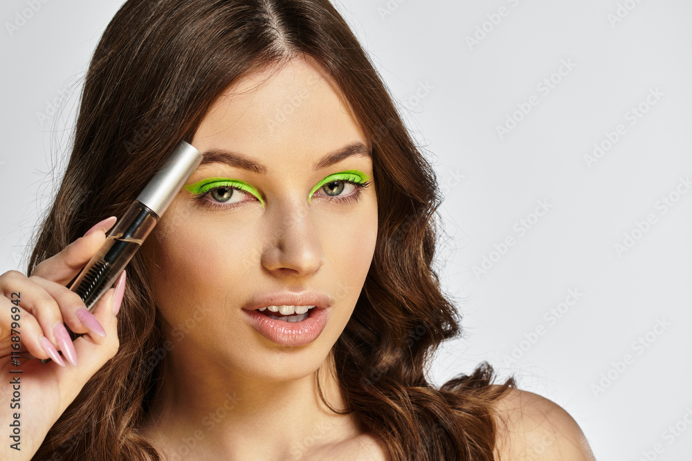 Vibrant green eyeshadow accentuates the beauty of a young woman in a stylish studio setting. Vibrant green eyeshadow accentuates the beauty of a young woman in a stylish studio setting.