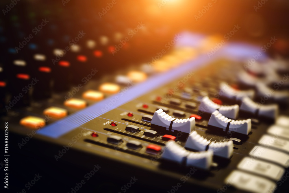 Close-up sound mixer sound record control system production in studio for producer live broadcasting or audio equipment music instrument speaker concepts. Close-up sound mixer sound record control system production in studio for producer live broadcasting or audio equipment music instrument speaker concepts.