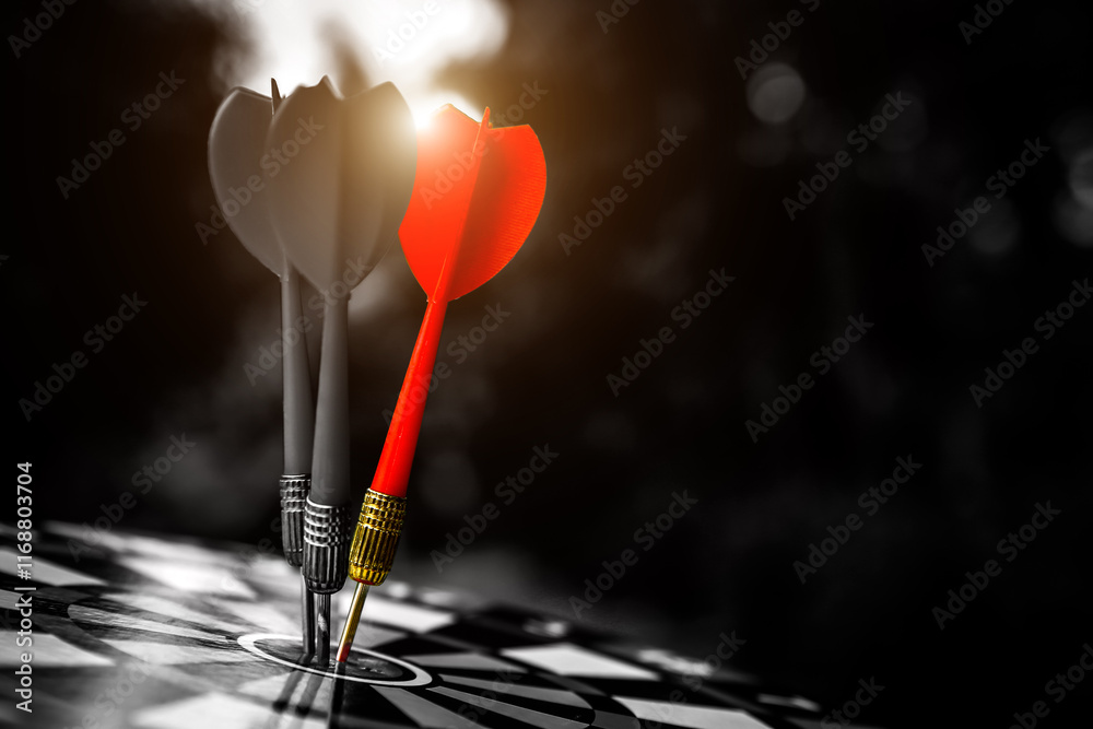 Dark bulls eye target or bullseye have red dart arrows throw hitting challenge the center of a shooting for financial business targeting planning growth or aim to winner goal of business win concept. Dark bulls eye target or bullseye have red dart arrows throw hitting challenge the center of a shooting for financial business targeting planning growth or aim to winner goal of business win concept.