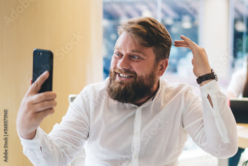 Excited Caucasian man shocked with received email with business opportunity, accomplished male freelancer in smart casual clothing making money banking with bitcoin for exchange cryptocurrency photo