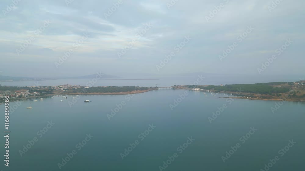 A panoramic view shows the town of Ayvalik on Turkey's Aegean coast, highlighting its charming architecture and vibrant landscape. A panoramic view shows the town of Ayvalik on Turkey's Aegean coast, highlighting its charming architecture and vibrant landscape.