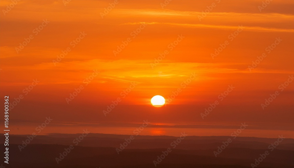 Obraz premium The point at which the temperature gradually drops in a bright orange sunset