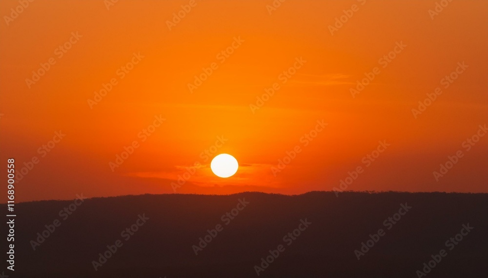 The point at which the temperature gradually drops in a bright orange sunset The point at which the temperature gradually drops in a bright orange sunset