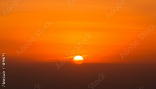 The point at which the temperature gradually drops in a bright orange sunset photo