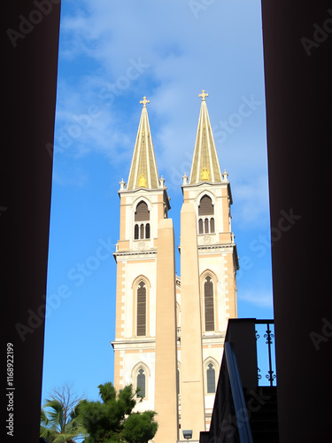 Twin belfries of Trinita dei Monti renaissance church with egyptian obelisk, seen from a side stairway photo