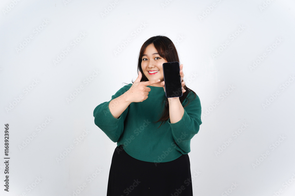 Smiling presenting and holding blank screen smartphone for ad or apps Of Beautiful Asian Woman wearing green Isolated On White Background Smiling presenting and holding blank screen smartphone for ad or apps Of Beautiful Asian Woman wearing green Isolated On White Background