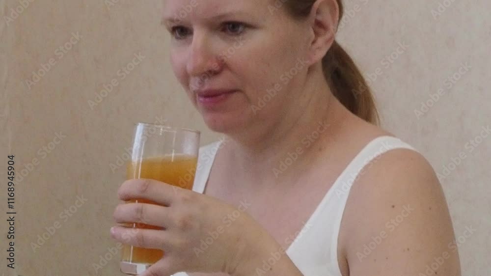 Beautiful pregnant woman drinking healthy fruit and vegetable juice. Fresh colorful healthy fruit juice. Healthy lifestyle in pregnancy. Smoothies for woman expecting baby. Beautiful pregnant woman drinking healthy fruit and vegetable juice. Fresh colorful healthy fruit juice. Healthy lifestyle in pregnancy. Smoothies for woman expecting baby.