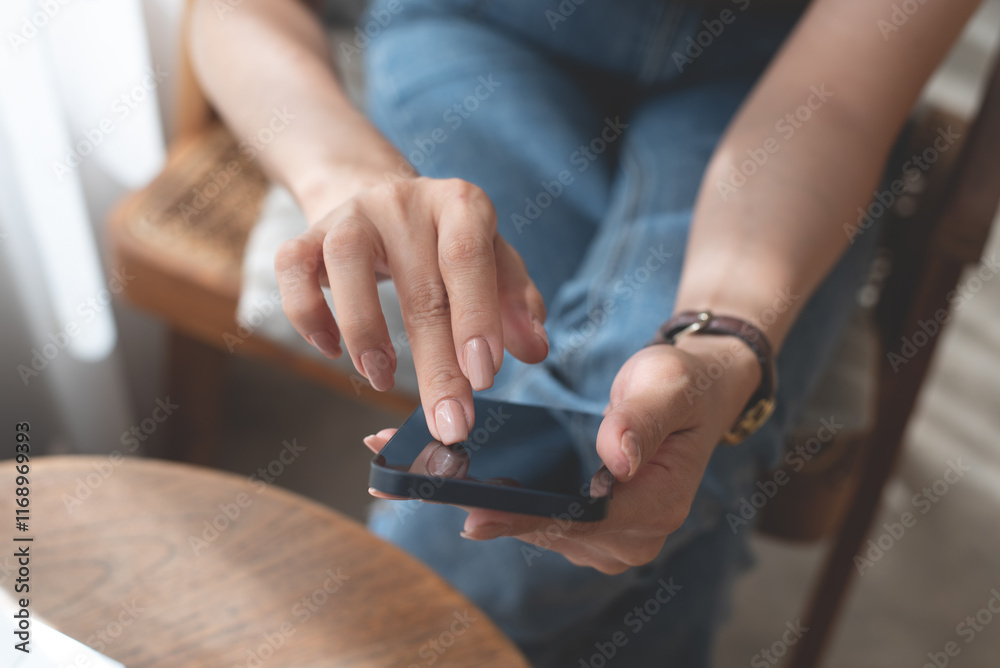 Obraz premium Close up of woman hand holding, using mobile phone for online shopping, digital payment via mobile banking app, social media, internet network, business and technology, people lifestyle