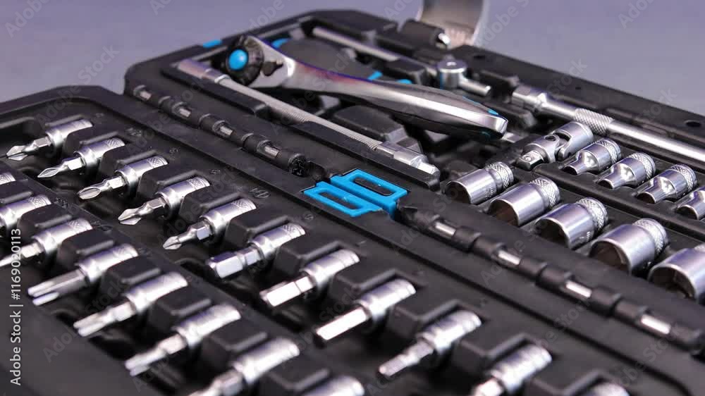 A tool case with a set of metal heads. Close-up. Soft focus. A tool case with a set of metal heads. Close-up. Soft focus.