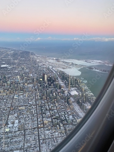 aerial view of the city from the window seat of a plane