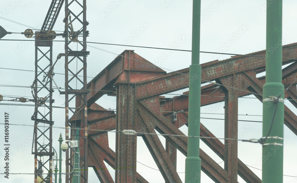 Bridge details, prominently displayed against a backdrop of a cloudy sky that adds atmosphere to the scene Bridge details, prominently displayed against a backdrop of a cloudy sky that adds atmosphere to the scene