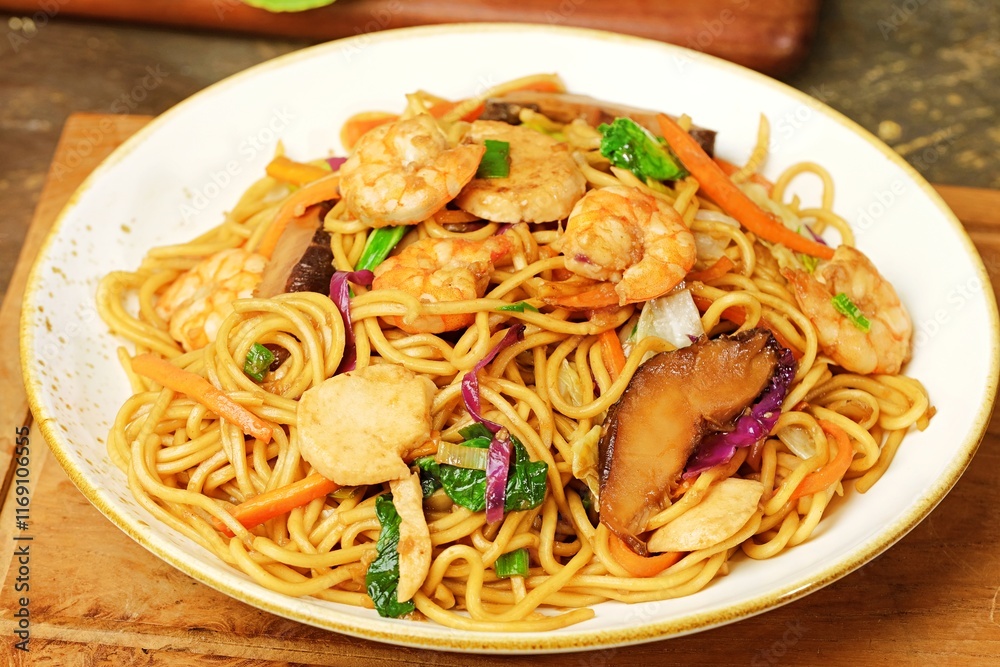 Japanese-style yakisoba noodles stir-fried with shrimp, vegetables, and savory sauce. 