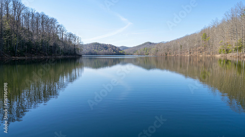 serene lake reflecting beauty of spring, surrounded by trees and mountains. calm water creates peaceful atmosphere, perfect for relaxation and nature appreciation