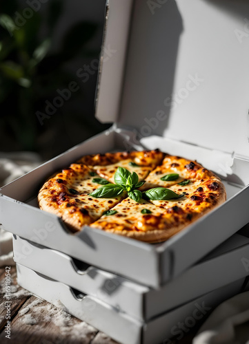Obraz na płótnie A stack of white pizza boxes with one box slightly opened, revealing a golden pizza slice with bubbling cheese and fresh basil on top w salonie