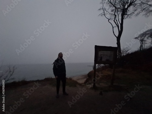 dunkle Silhouette einer Person im mystischen Geisterwald in Nienhagen (Mecklenburg - Vorpommern) bei Nacht photo