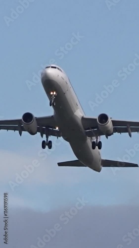 upward belly view aircraft taking off from airport unique perspective airplane ascends into sky, underbelly landing gear take off aviation runway airport operations aerial view