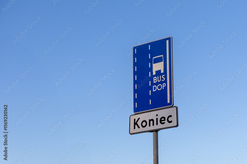 End of dedicated bus lane traffic sign against clear blue sky, indicating the conclusion of a bus-only road section End of dedicated bus lane traffic sign against clear blue sky, indicating the conclusion of a bus-only road section